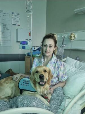 Lexi in hospital with her owner