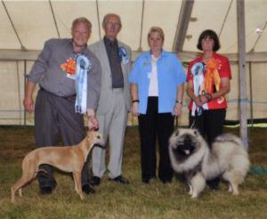 Honey winning Best Puppy in Show